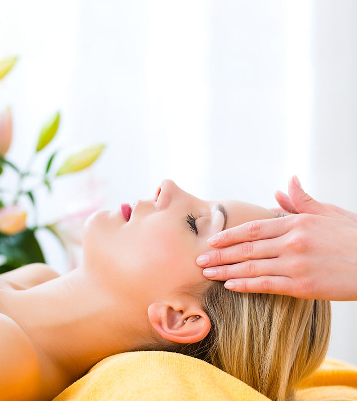 A girl getting a head massage