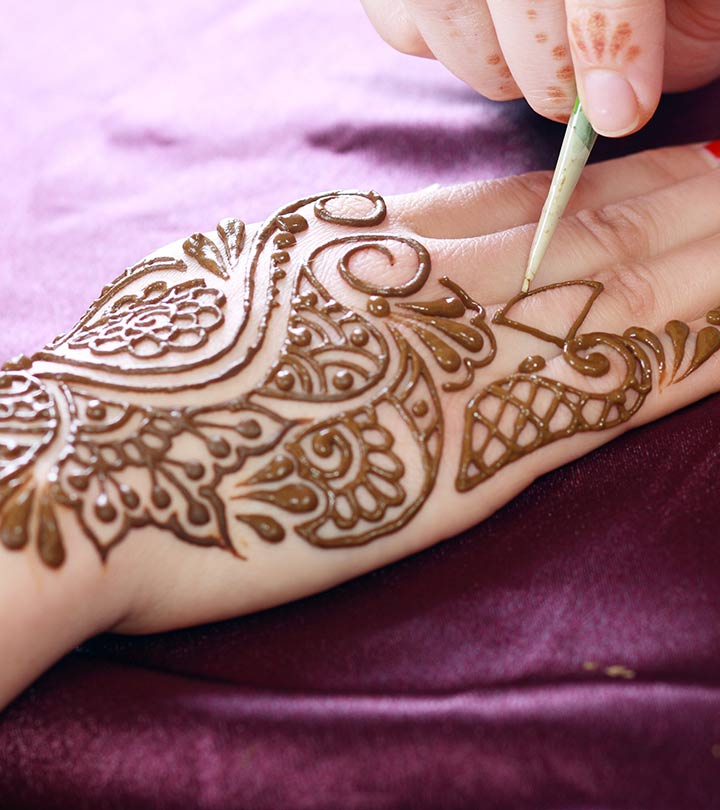 Girl hand with mehendi design