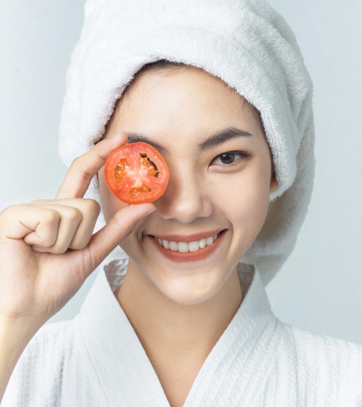 Woman Applying DIY Tomato Face Mask