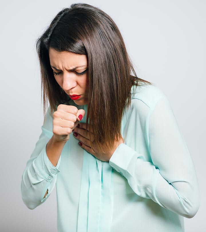 A woman coughing A woman coughing