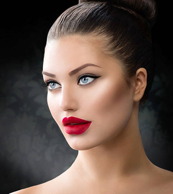 A girl with beautiful eyeliner and red lipstick
