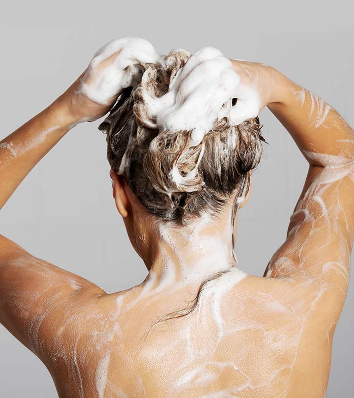 A woman having egg shampoo
