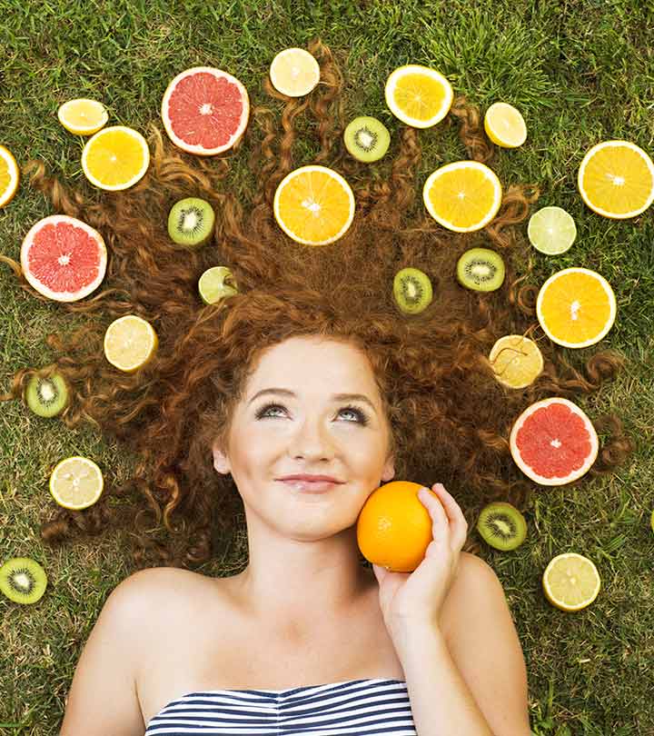 A curly hair girl with lots of fruit slices A curly hair girl with lots of fruit slices