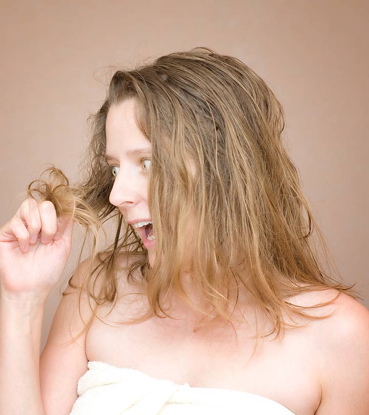 Women Moisturizing Her Hair