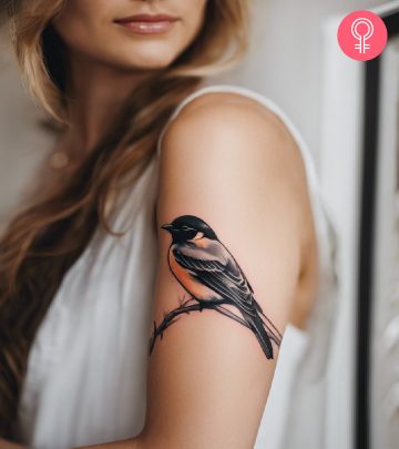 Bird tattoo on the arm of a woman