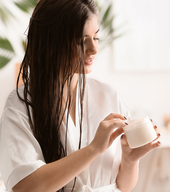 Woman Using Vaseline For Potential Hair Care Benefits Woman Using Vaseline For Potential Hair Care Benefits