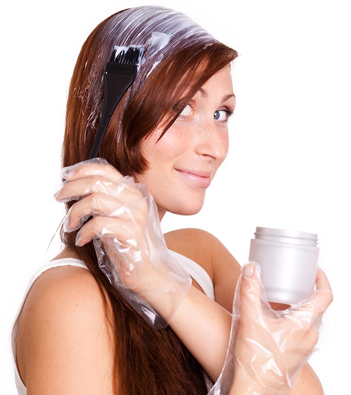 Woman Using Hair Straightener Cream Safely At Home