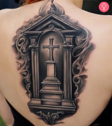 A woman sports a tombstone tattoo on her back A woman sports a tombstone tattoo on her back