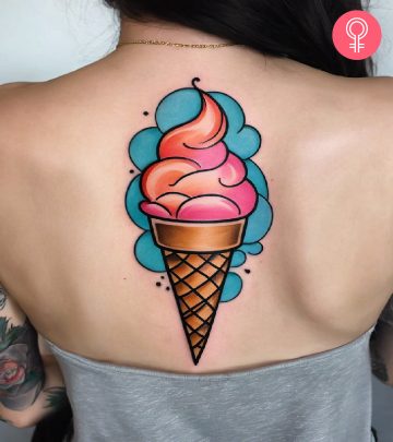 A woman flaunting an ice cream tattoo on her back A woman flaunting an ice cream tattoo on her back