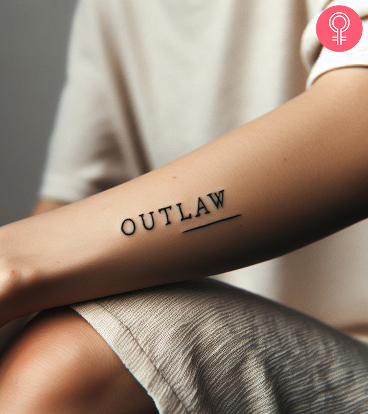 8 Outlaw Tattoo Ideas And Designs With Meanings An outlaw text tattoo on the forearm