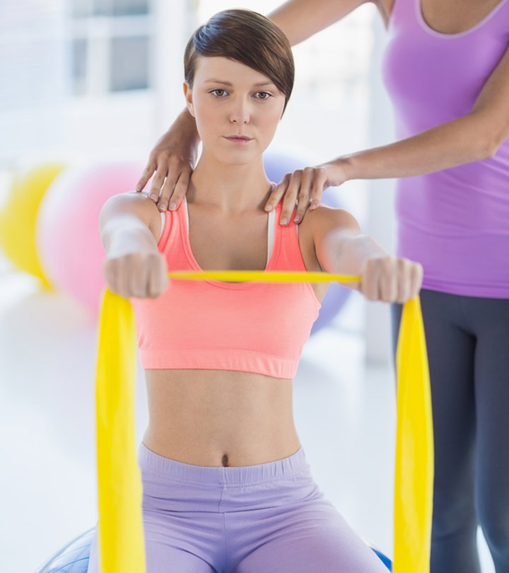 A girl doing a shoulder labral tear exercise