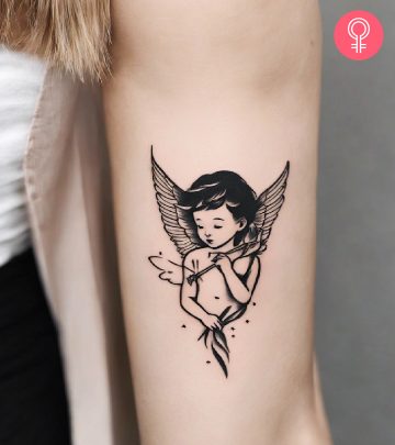 8 Stunning Eye-Catching Cupid Tattoo Ideas A blue Power Ranger tattoo on the forearm
