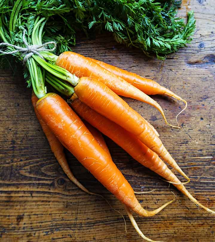 Lots of fresh carrots with leaves Lots of fresh carrots with leaves