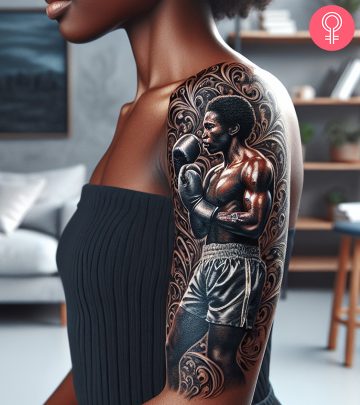 A boxer tattoo on a woman’s bicep A boxer tattoo on a woman’s bicep