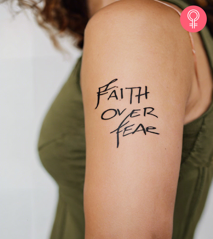 Top 8 Amazing Faith Over Fear Tattoo Designs A faith over fear tattoo on a woman’s shoulder