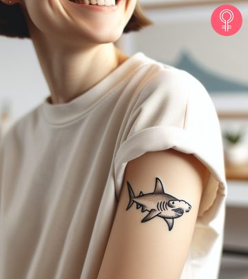 8 Hammerhead Shark Tattoo Ideas With Meanings A woman with an eagle and snake tattoo on her arm
