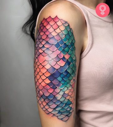 8 Eye-Catching Mermaid Scales Tattoo Designs A blue Power Ranger tattoo on the forearm