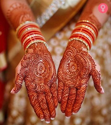 Women With Mehandi On Hand