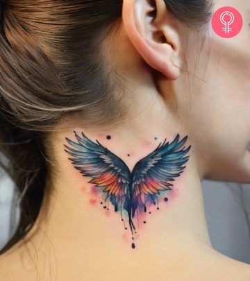 A woman sporting a wings neck tattoo A woman sporting a wings neck tattoo