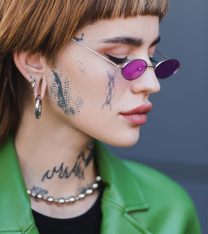 A woman sporting multiple tattoos on parts of the body that have a thin layer of skin.