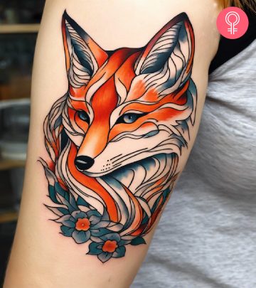 A woman with a kitsune tattoo A woman with a kitsune tattoo