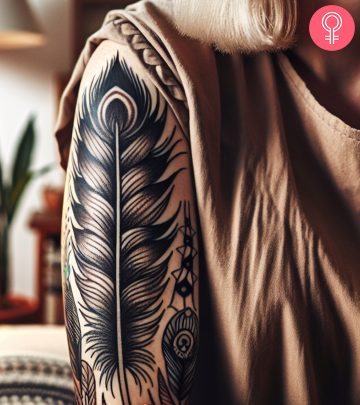 A woman with a tribal feather tattoo A woman with a tribal feather tattoo