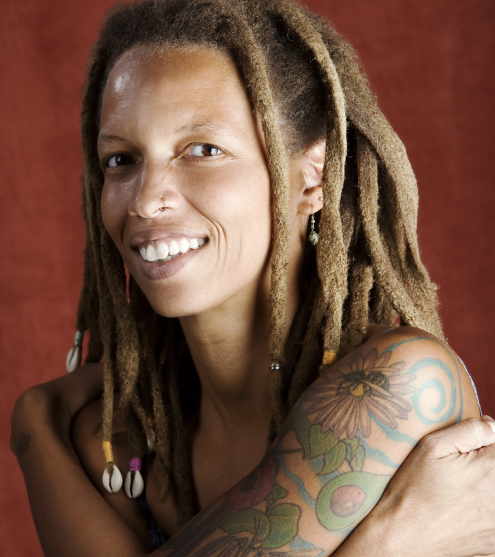 An African woman with colored tattoos An African woman with colored tattoos