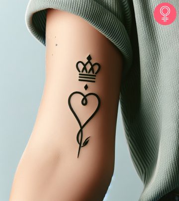 Woman with Queen of Hearts tattoo on her arm Woman with Queen of Hearts tattoo on her arm
