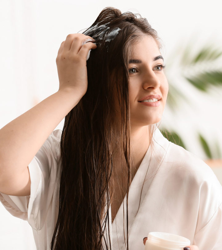 women applying Homemade scalp scrubs on her scalp women applying Homemade scalp scrubs on her scalp