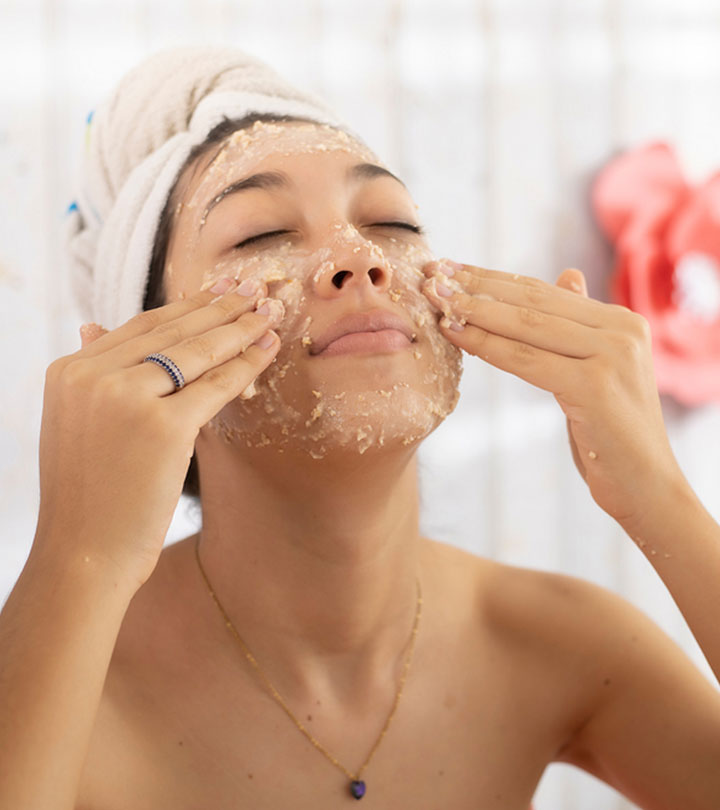 Women applying colloidal oatmeal face mask