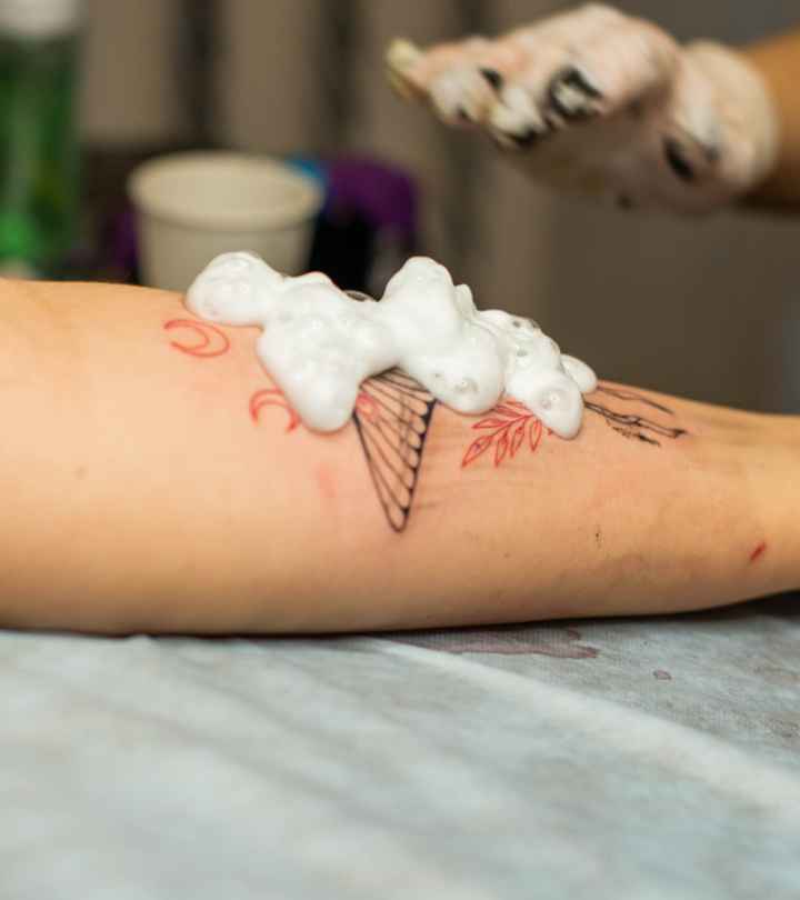 how long after a tattoo can you wash it with soap