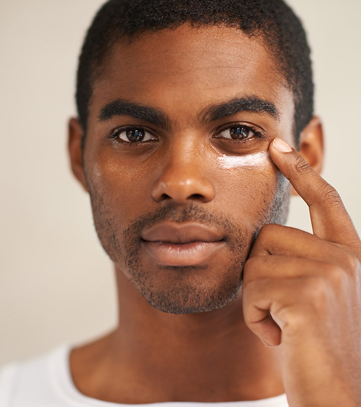 Person Applying Eye Cream