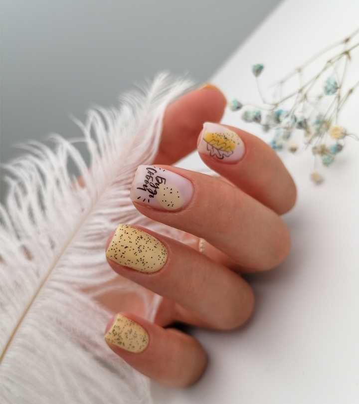 Girl fingers with beautiful nail decals