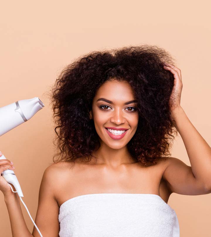 A girl blow-drying her hair