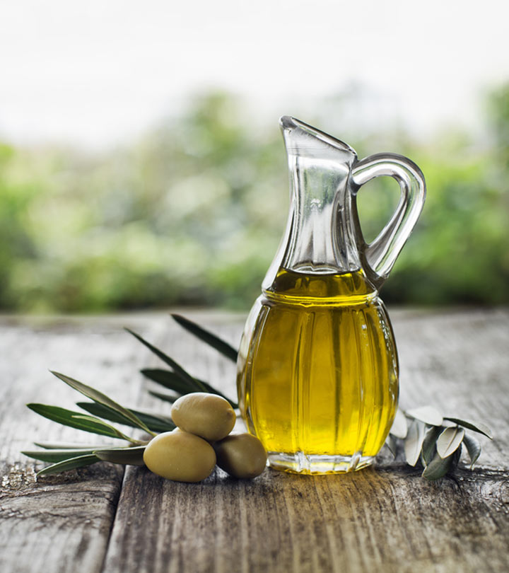 Applying olive oil to hair to get rid of lice