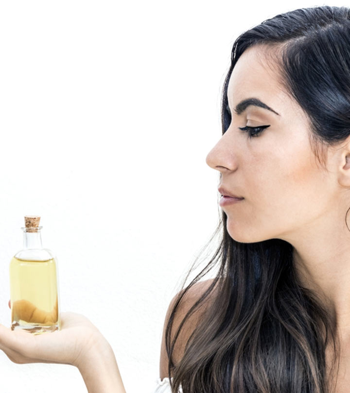 woman with argan oil for hair growth