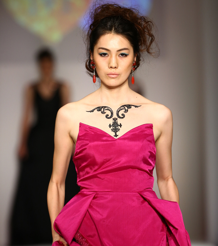 Inked model on the runway Inked model on the runway