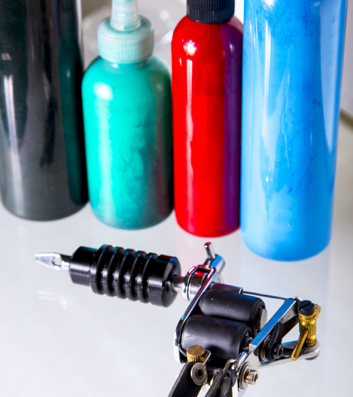 Tattoo ink bottles and a tattoo machine