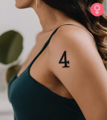Number 4 tattoo on the shoulder of a woman