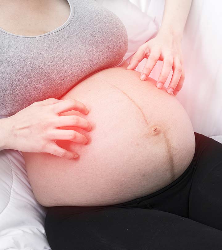 Pregnant Woman With A Rash On Her Belly