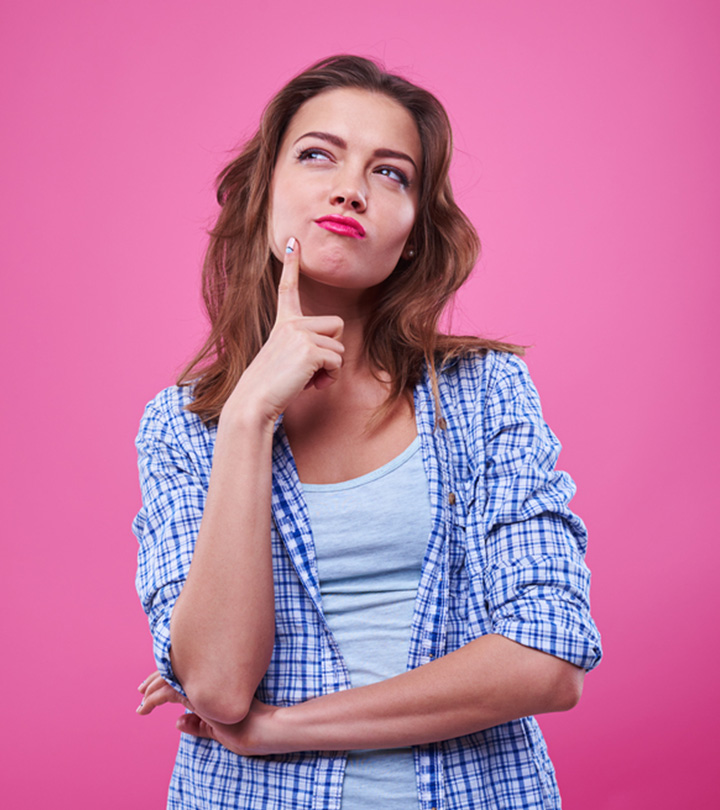 Woman Thinking To Apply Toner To Wet Hair Woman Thinking To Apply Toner To Wet Hair