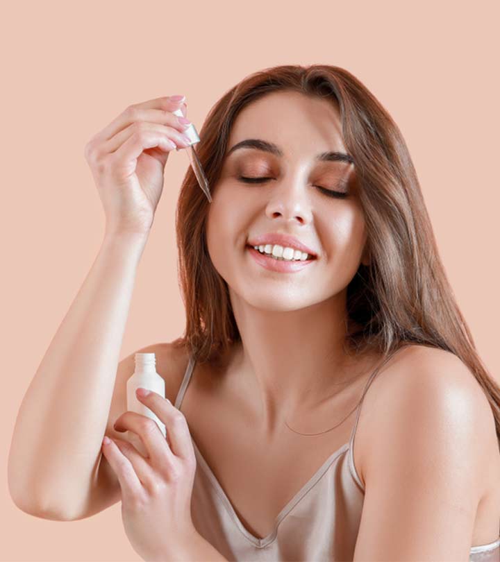 Woman Applying Sodium Hyaluronate On Face