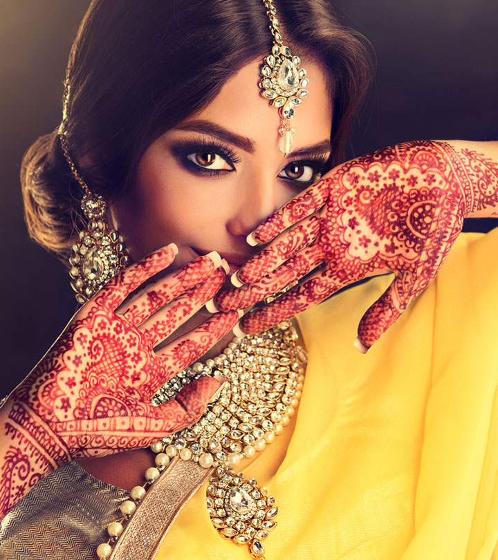 A woman with engagement mehndi designs
