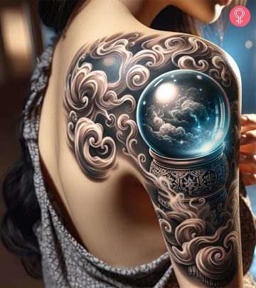 A woman flaunting a crystal ball on her arm A woman flaunting a crystal ball on her arm