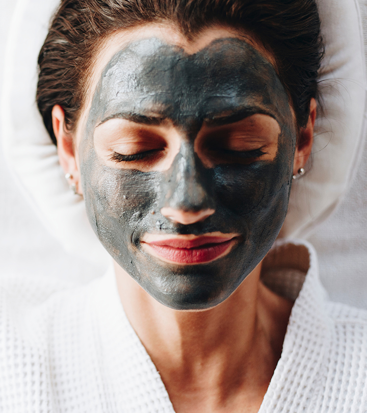 Women applied volcanic ash face pack on her face Women applied volcanic ash face pack on her face