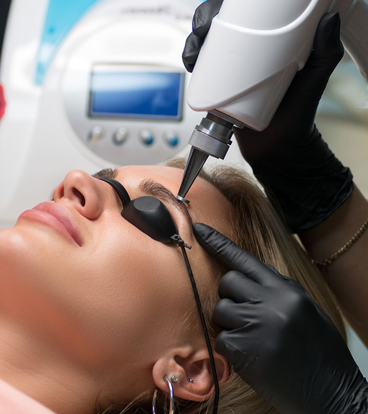 A woman is undergoing the eyebrow tattoo removal process