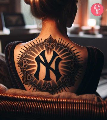 8 Dynamic Yankees Tattoo Designs For Expressing Fandom & Pride A woman with an eagle and snake tattoo on her arm